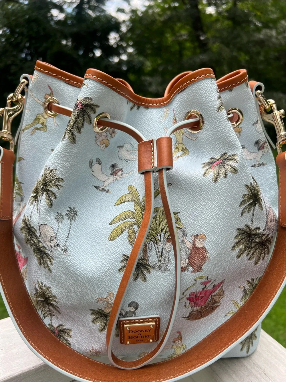 DOONEY AND BOURKE DISNEY PETER PAN DRAWSTRING HOBO BAG